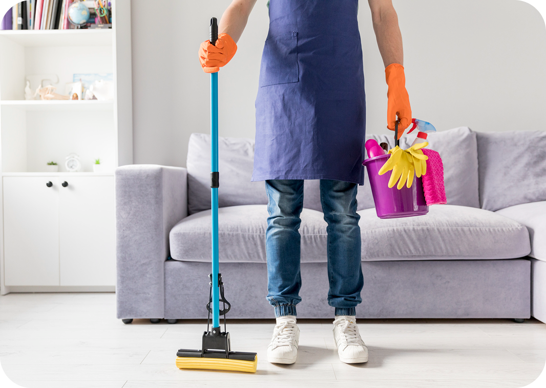 Professional cleaner mopping floor